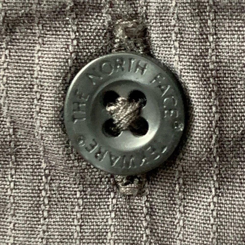 The North Face pit length